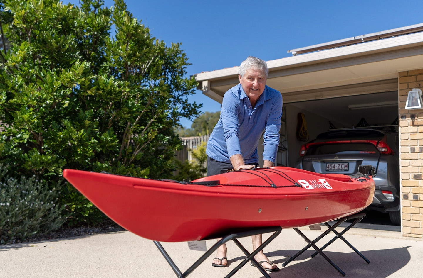 Bill Van Nierop with his kayak at home