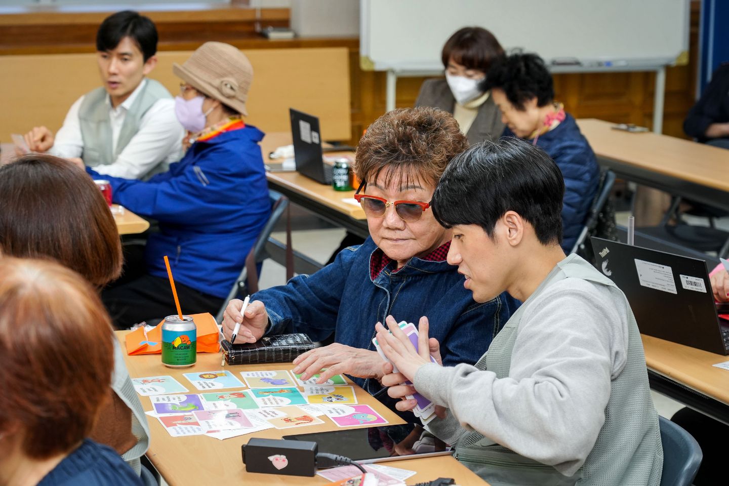 Boehringer Ingelheim Korea and Vietnam colleagues and nursing home residents bonded over the B-Effect Match & Chat game cards in Seoul and Thu Duc respectively, Oct 2023